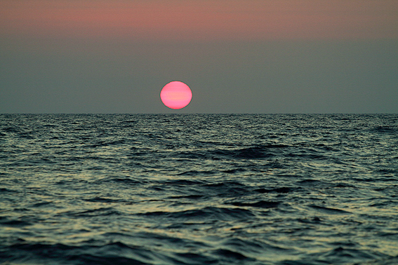 red sun kisses the ocean, HELMSail